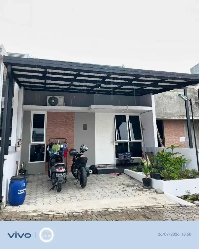 Kanopi baja ringan dan garasi