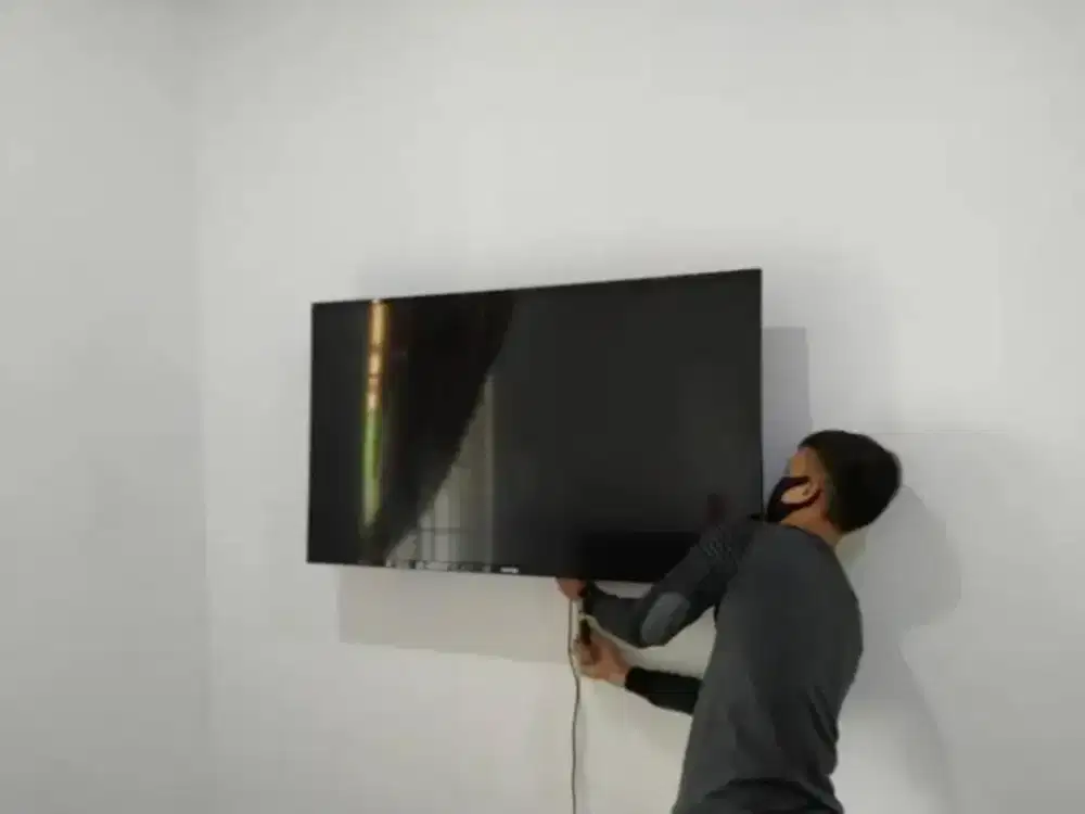 Jual dan pasang bracket tv fleksibel