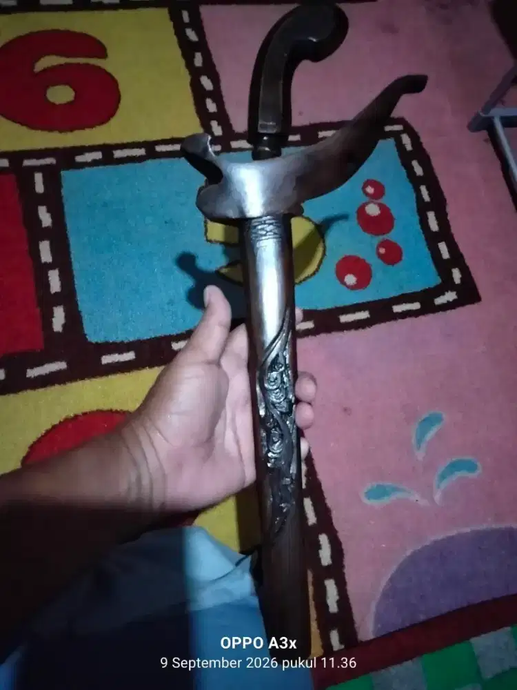 Keris peninggalan bertulisan bahasa arab kuningan