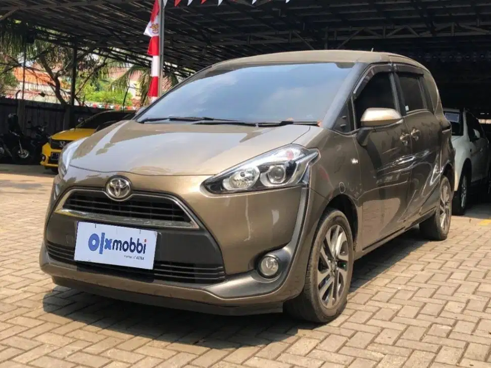 TDP 7, JT Toyota Sienta 1.5 V Bensin-AT Coklat 2017