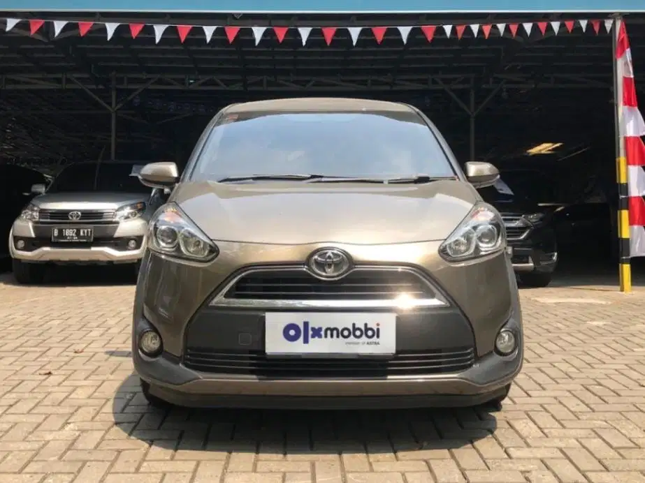 TDP 7, JT Toyota Sienta 1.5 V Bensin-AT Coklat 2017