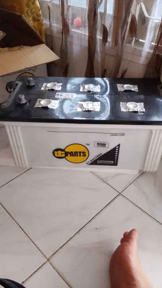AKI BASAH (Heavy duty battery) berkapasitas 200ah merek United Tractor