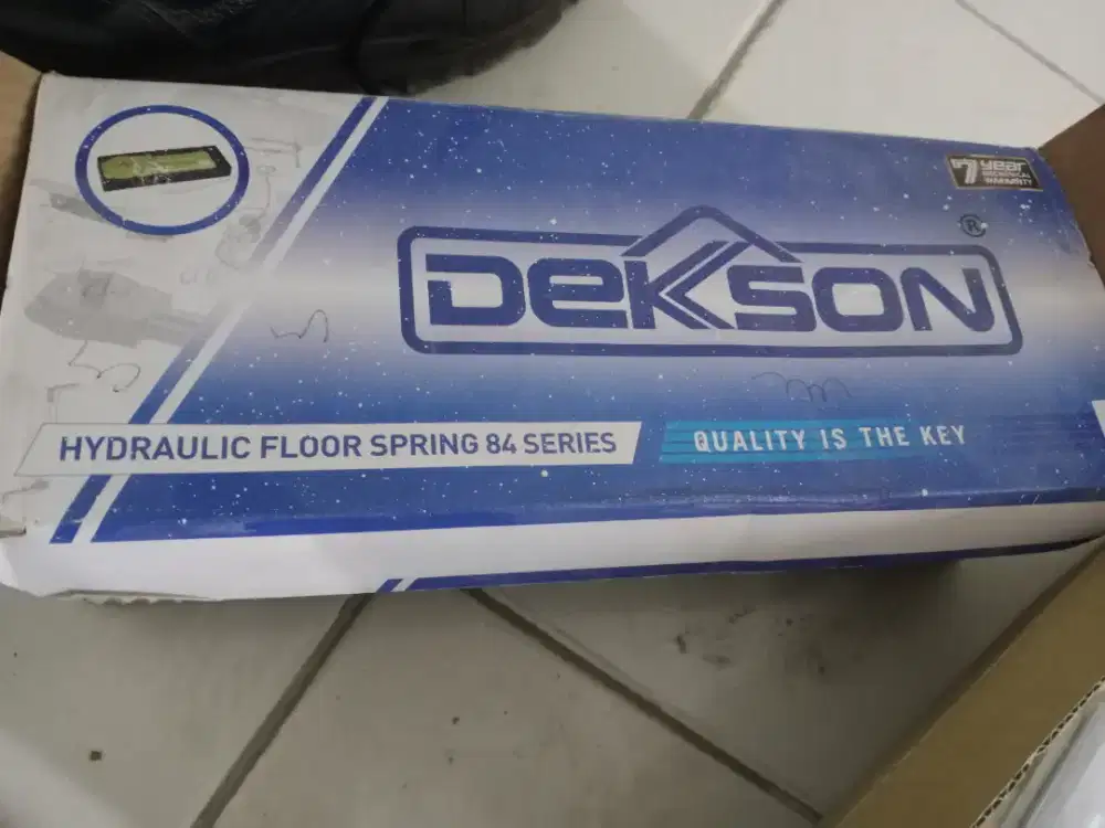 Floor hinge pintu dekson