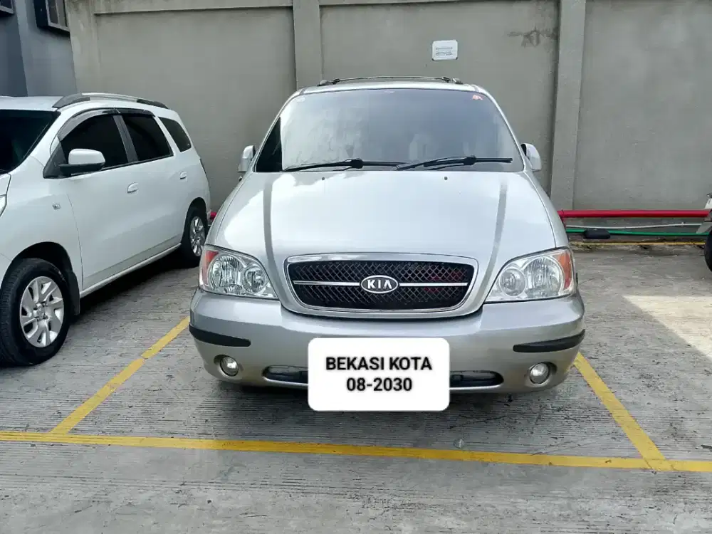 KIA SEDONA.MT BENSIN - 2004