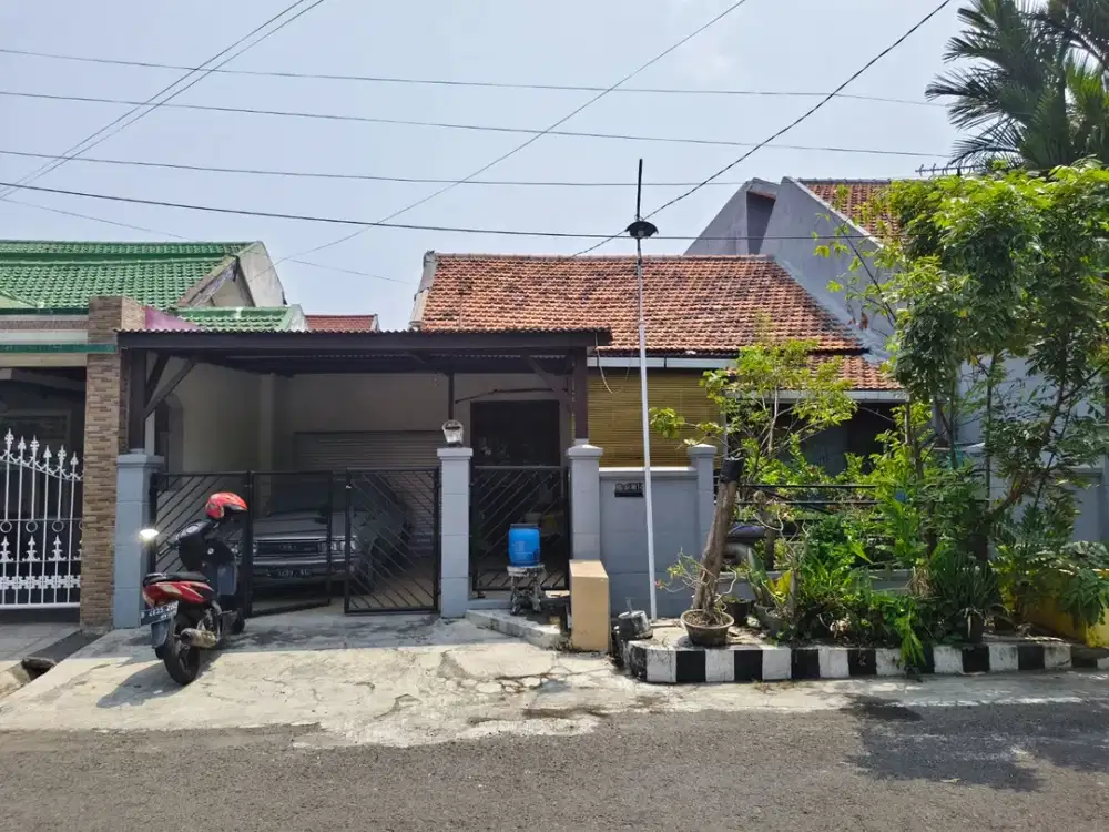 rumah 1 lantai Rungkut Asri timur Surabaya, gate di raya merr