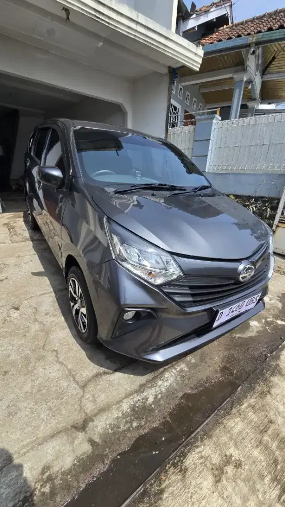 Sigra x 1.2 manual tahun 2024