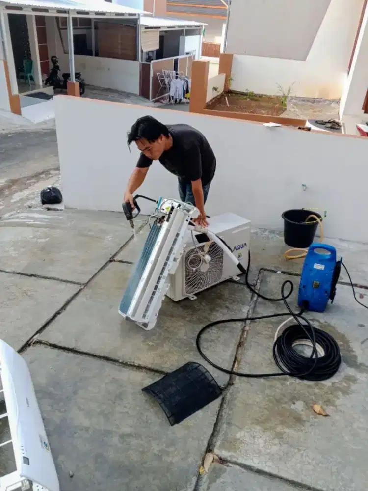 Jasa bongkar pasang AC cuci AC kulkas showcase freezer mesin cuci