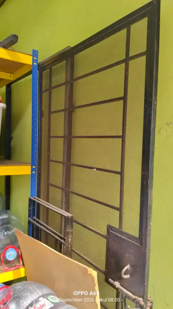 Tralis pintu rumah
