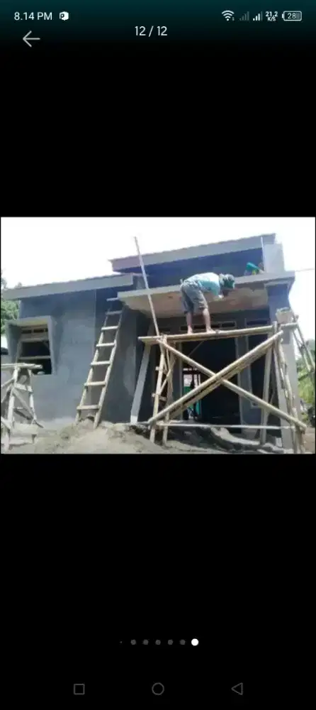 Tukang bangunan profesional