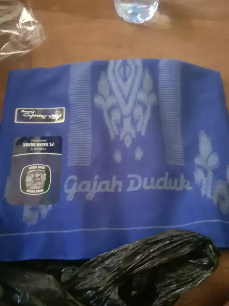 Sarung cap gajah..duduk..Masi baru
