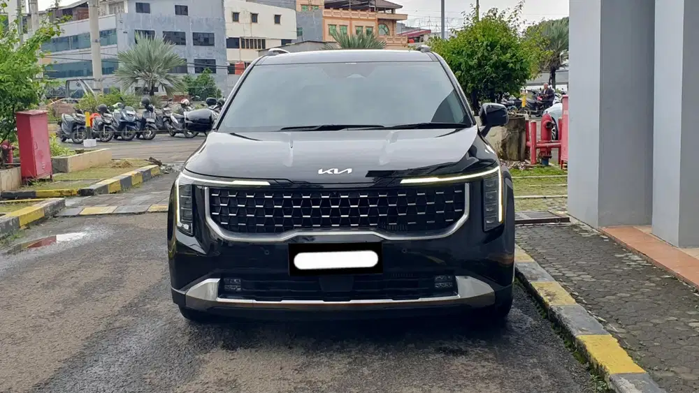 Km 32rb kia grand carnival premiere 2024 hitam 7 seater
