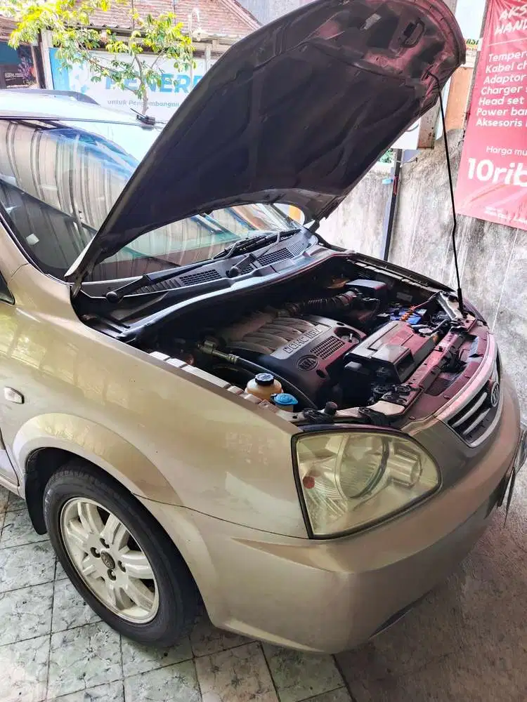 Kia Carens II 2004 Bensin