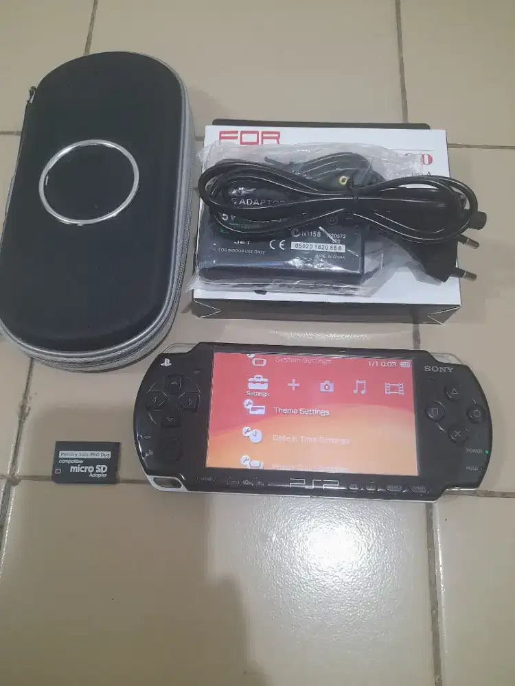 Psp slim seri 2000 Memory 8gb Mulus Full game Plus dapet Dompetnya