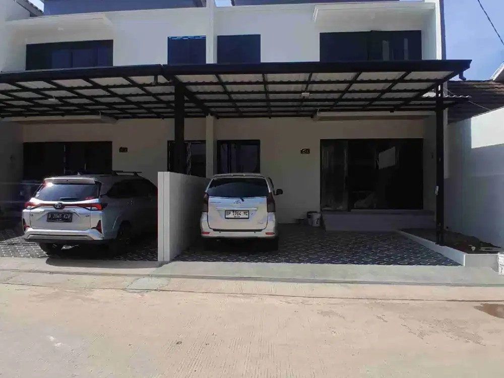 rumah 2 lantai bangunan berkualitas akses 2 mobil