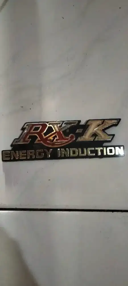 emblem samping motor RX-K