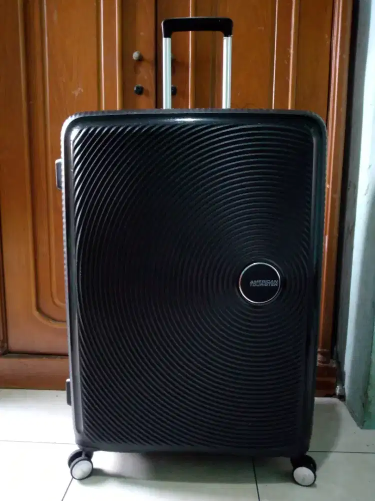 American TOURISTER curio spinner by Samsonite size 30 inch