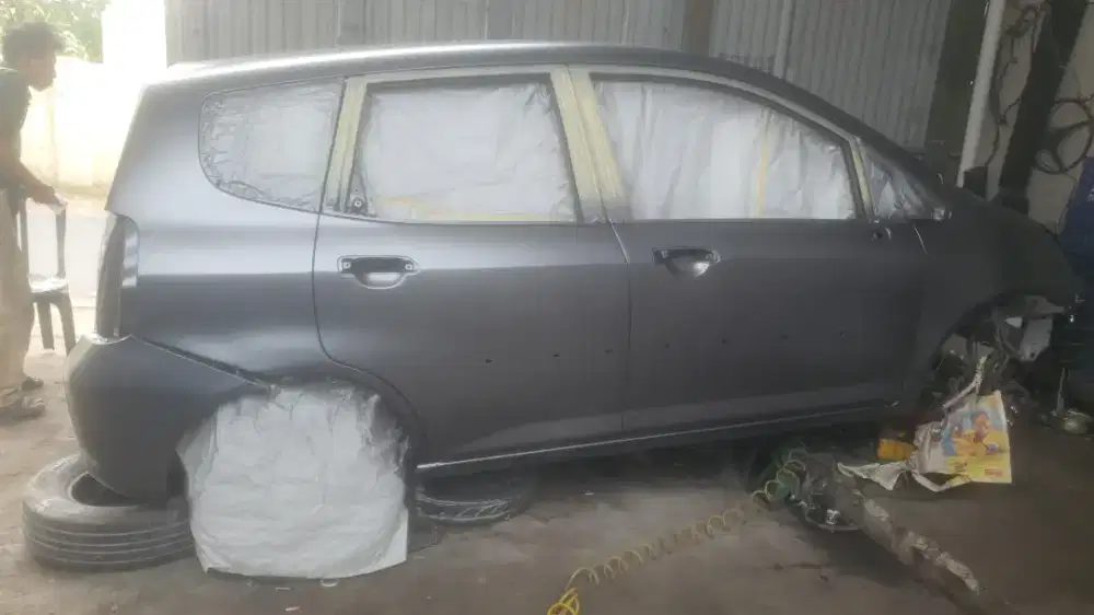 Assiten mekanik mobil