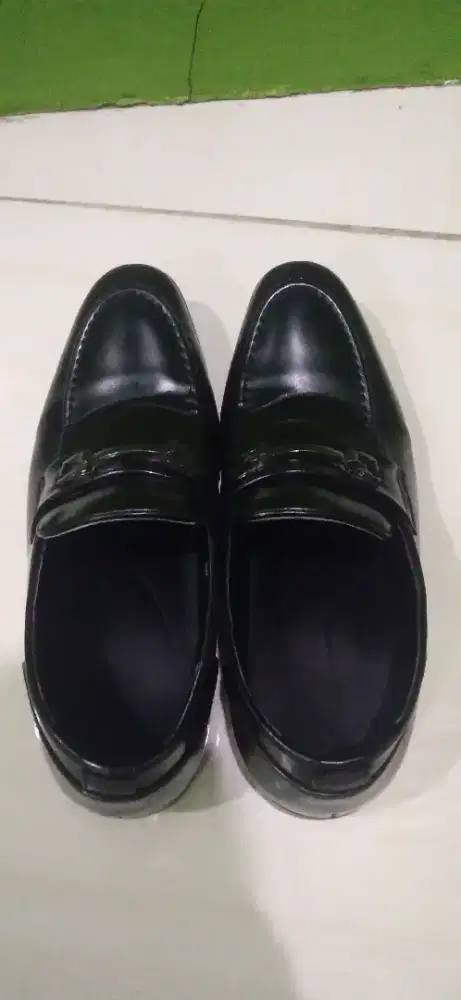 Sepatu komaladin