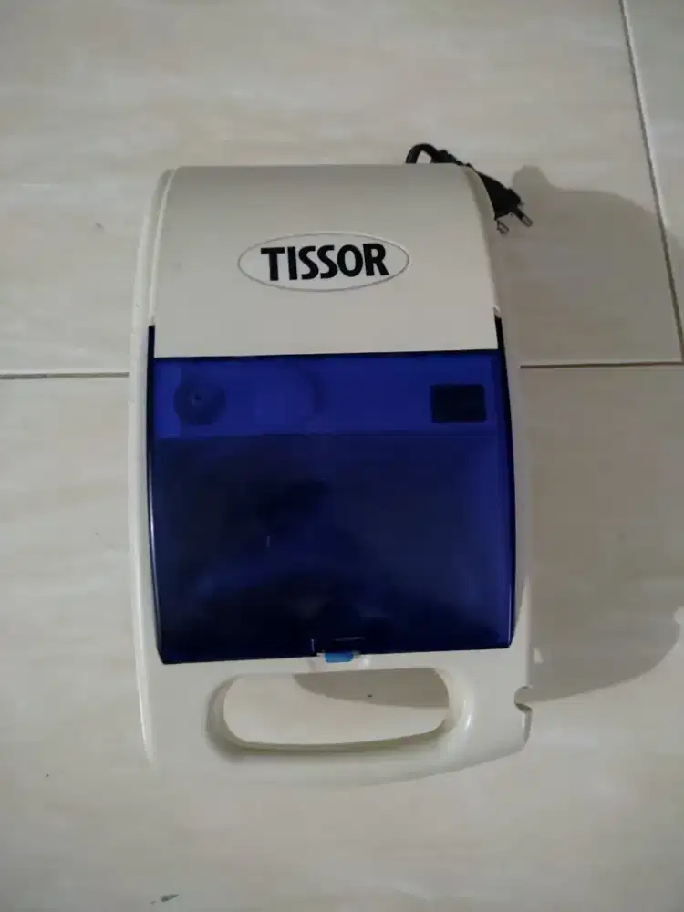 Alat uap merek tissor.