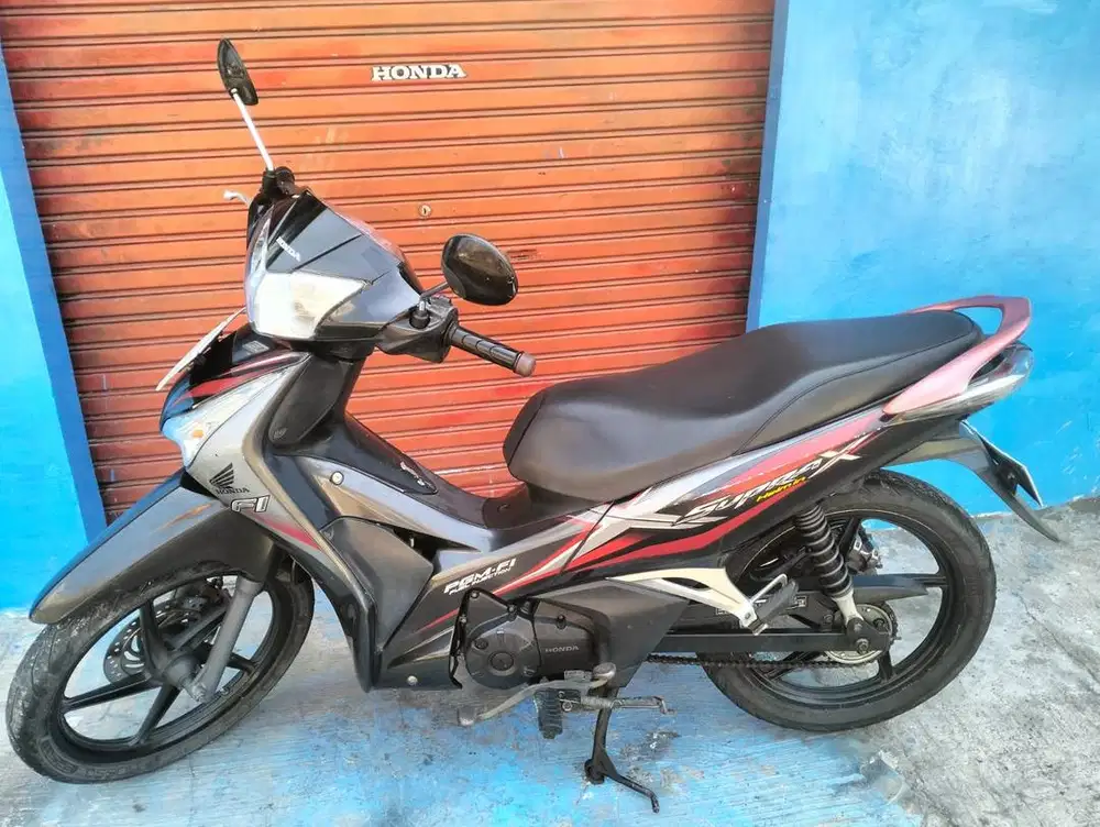 Honda supra x 125 helmin 2012 mulus