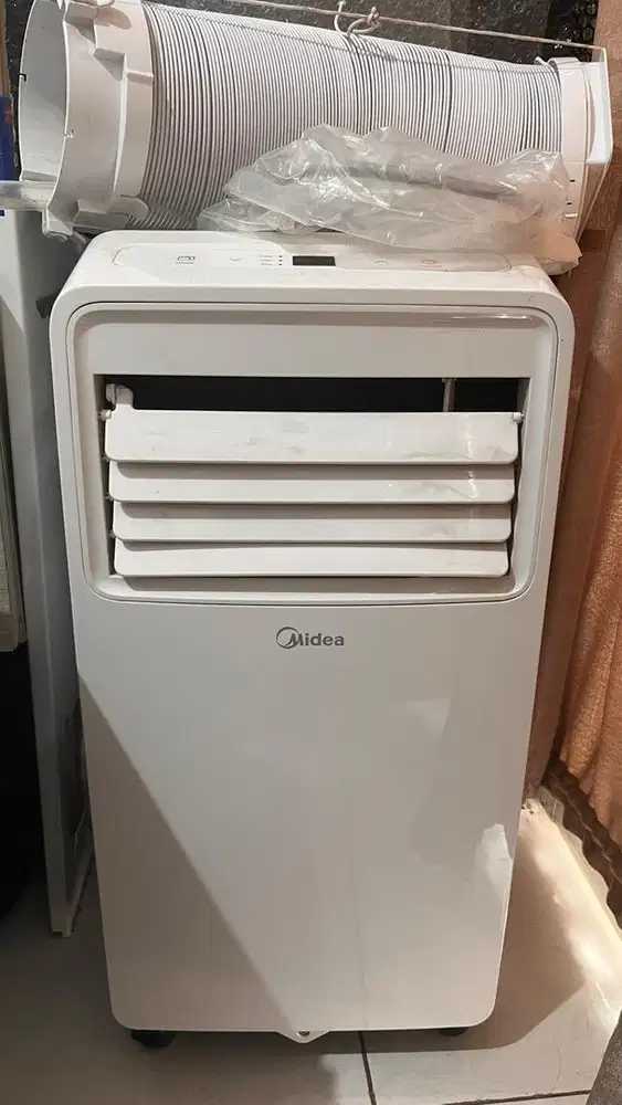 AC Portable Midea 0.5 pk
