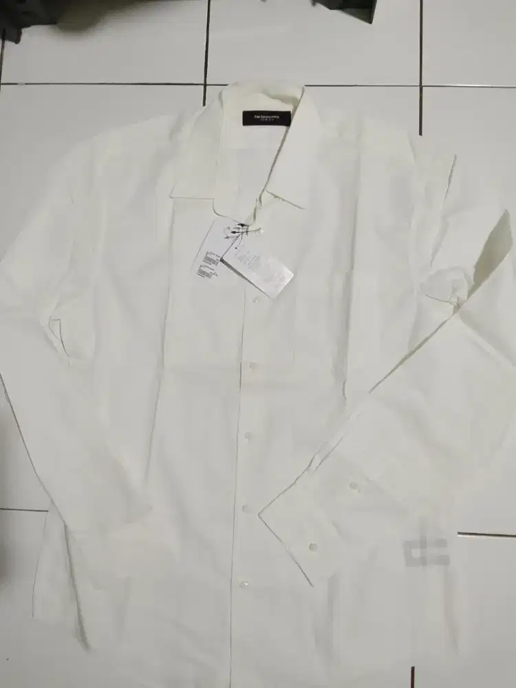 The executive kantor,size L,kondisi baru,jual 80k