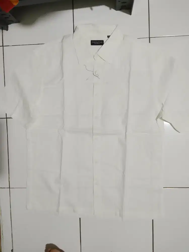 The executive kantor, size L, kondisi baru,jual 125k