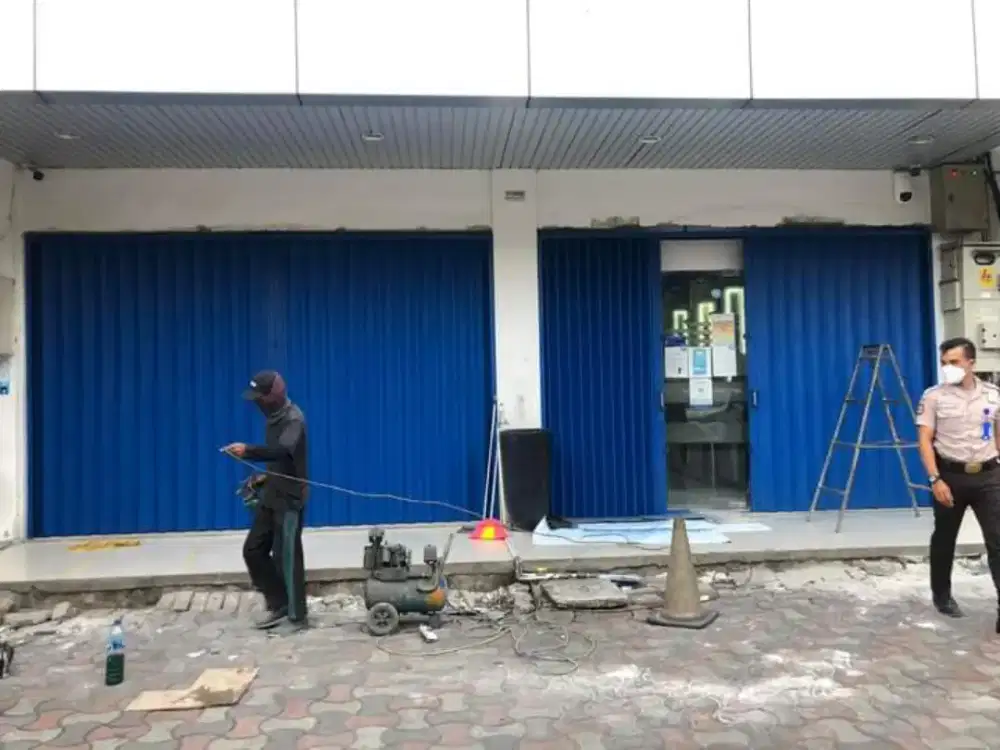Tukang service reparasi rolling door folding gate murah