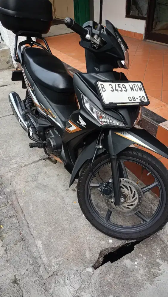 Honda motor bebek Supra X