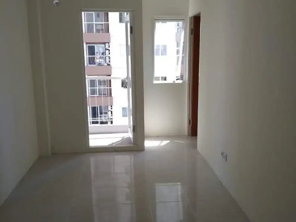 Puncak Dharmahusada 2BR Kosongan Lantai 10 Hanya 195Jt