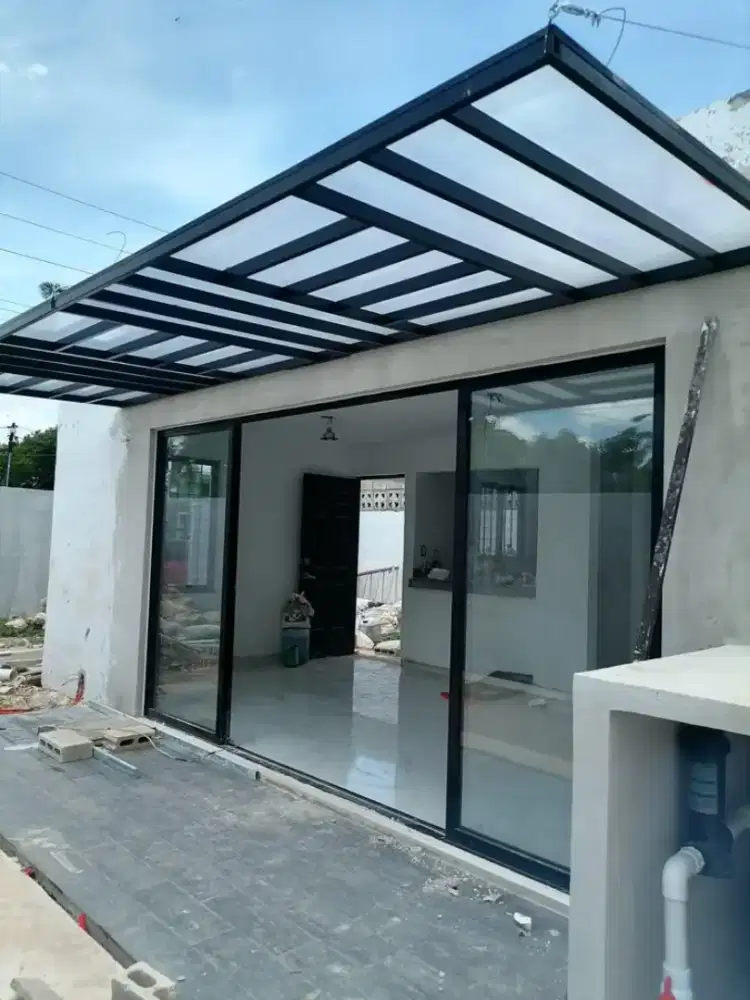 Kanopi Kaca Elegan, Rumah Makin Menawan