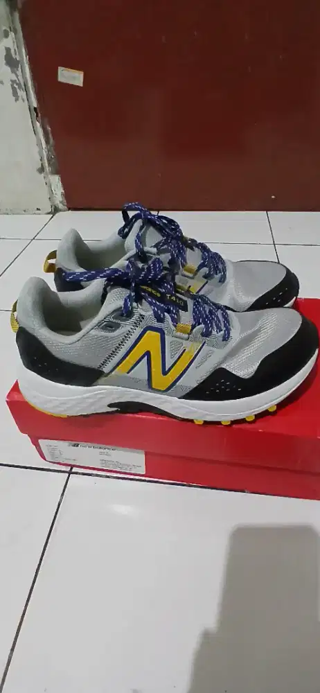 Sepatu New Balance T410
