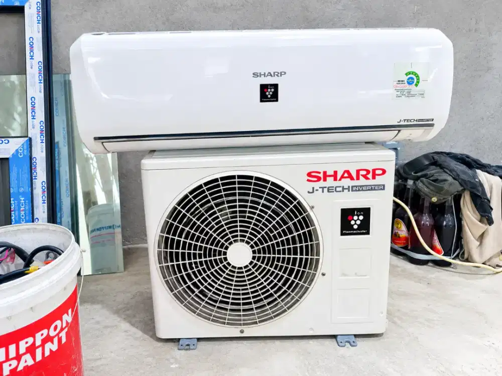 Sharp inverter 1/2pk super hemat