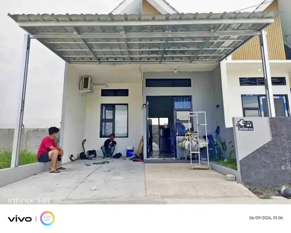 Kanopi baja ringan dan garasi
