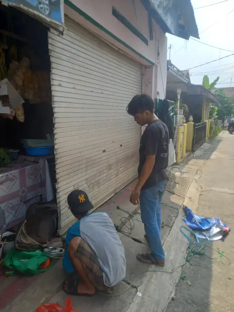 Tukang pasang service pintu rolling door dan folding gate murah
