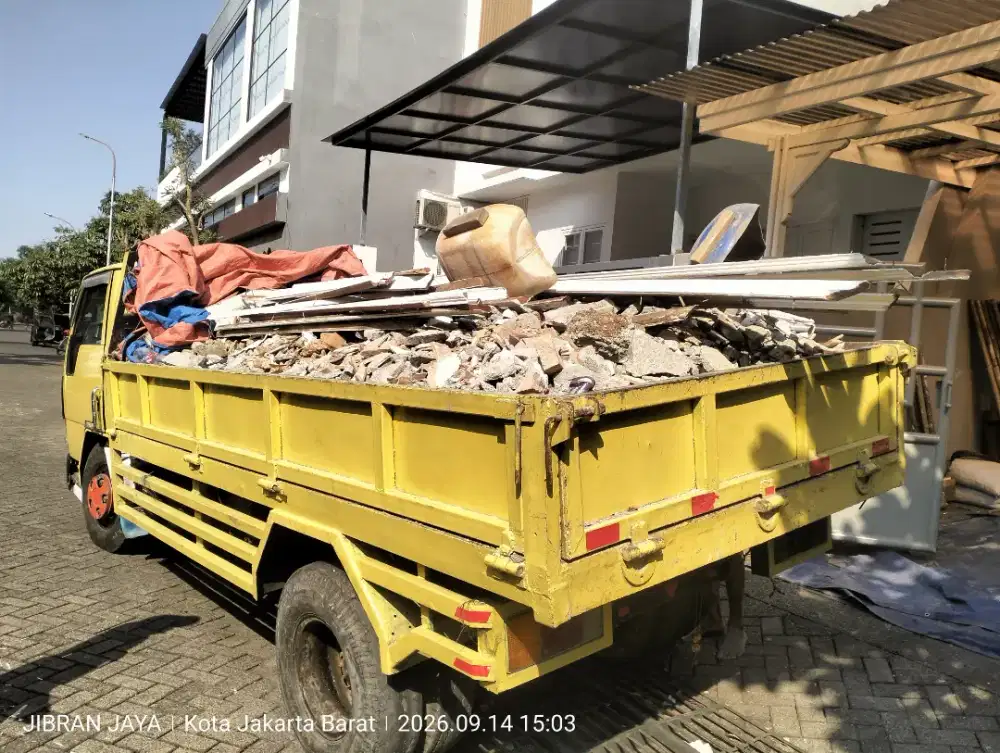 Jasa buang puing tanah