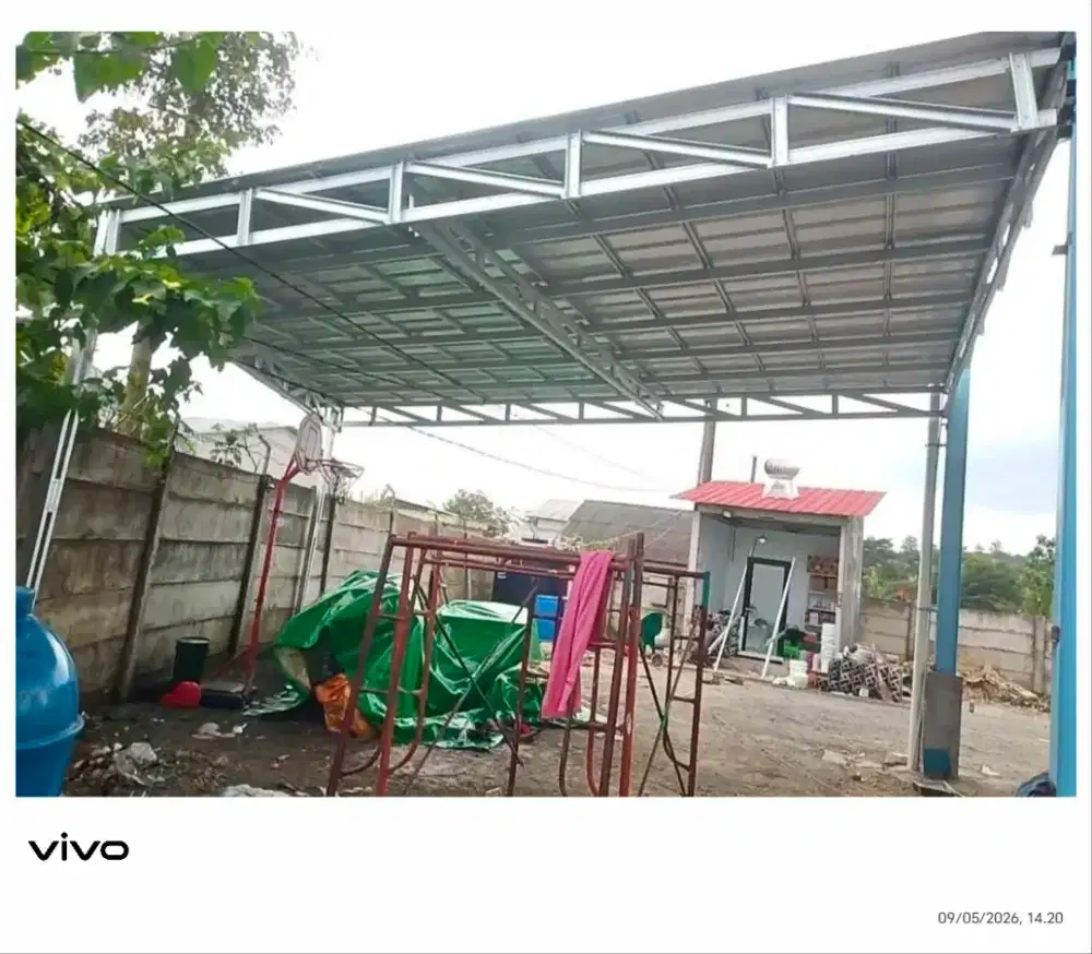 Tukabg pasang baja ringan