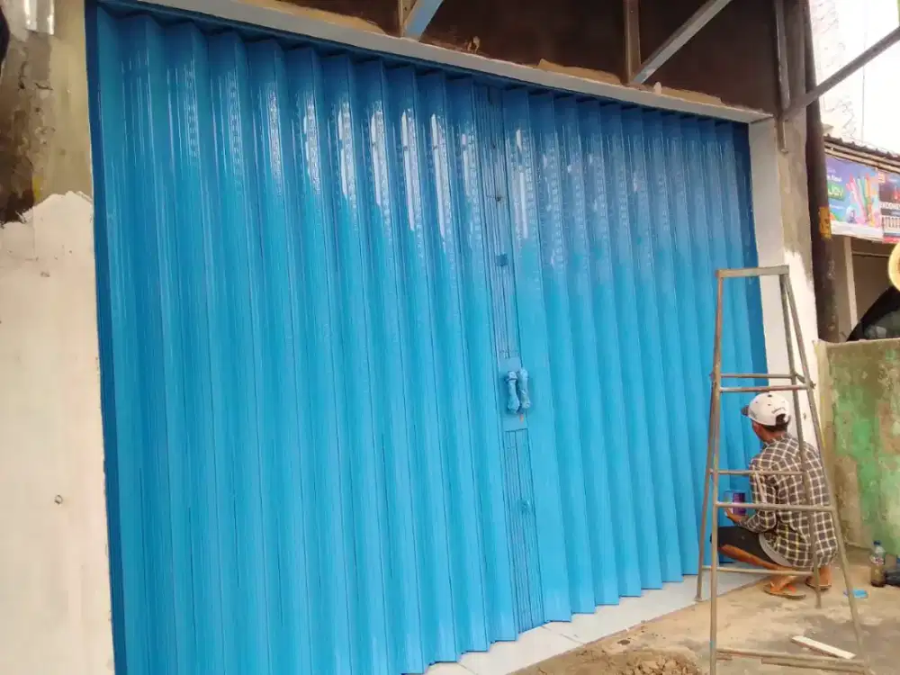 Rolling door galvanis folding gate besi