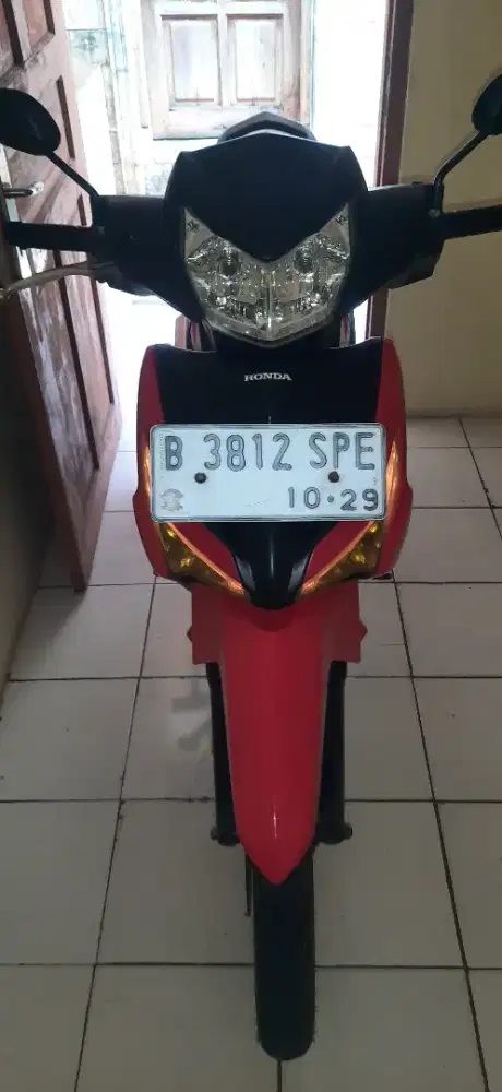 Jual honda supra x 125 fi 2014 merah hitam pemakain wajar motor normal