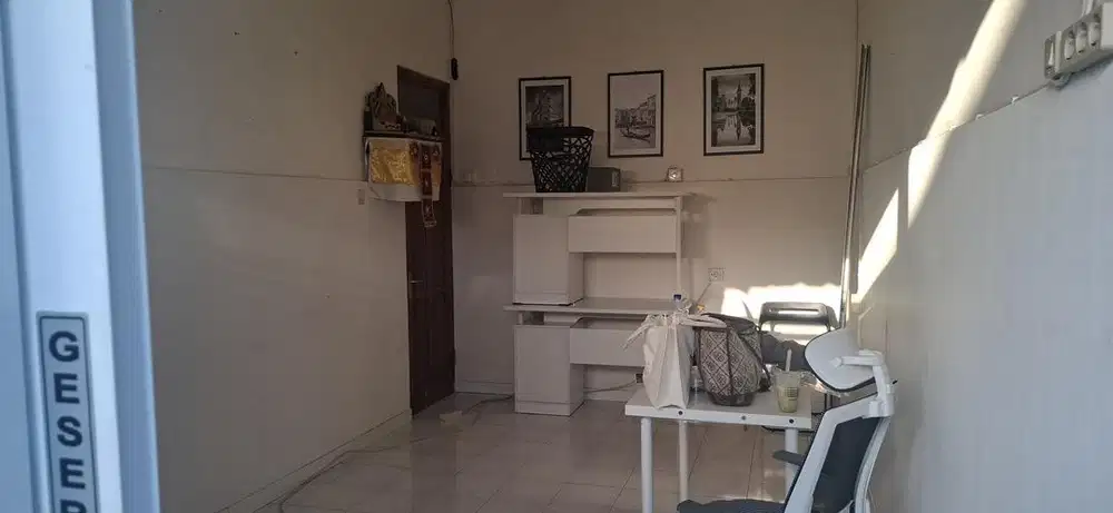 Over kontrak Toko