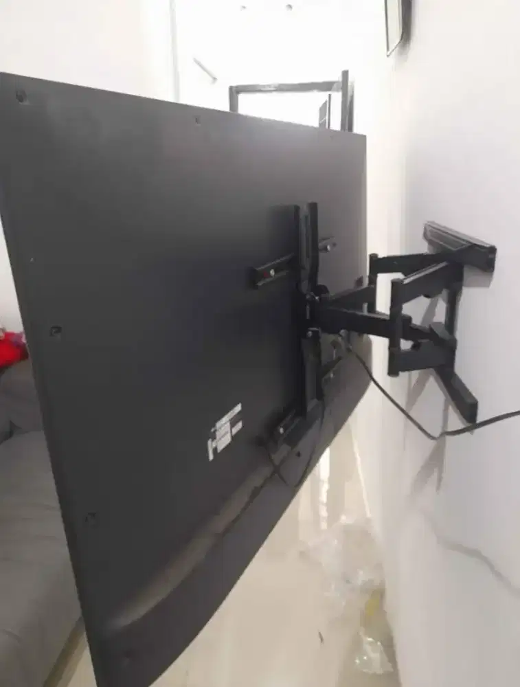 Jual dan pasang bracket tv  led lcd plasma