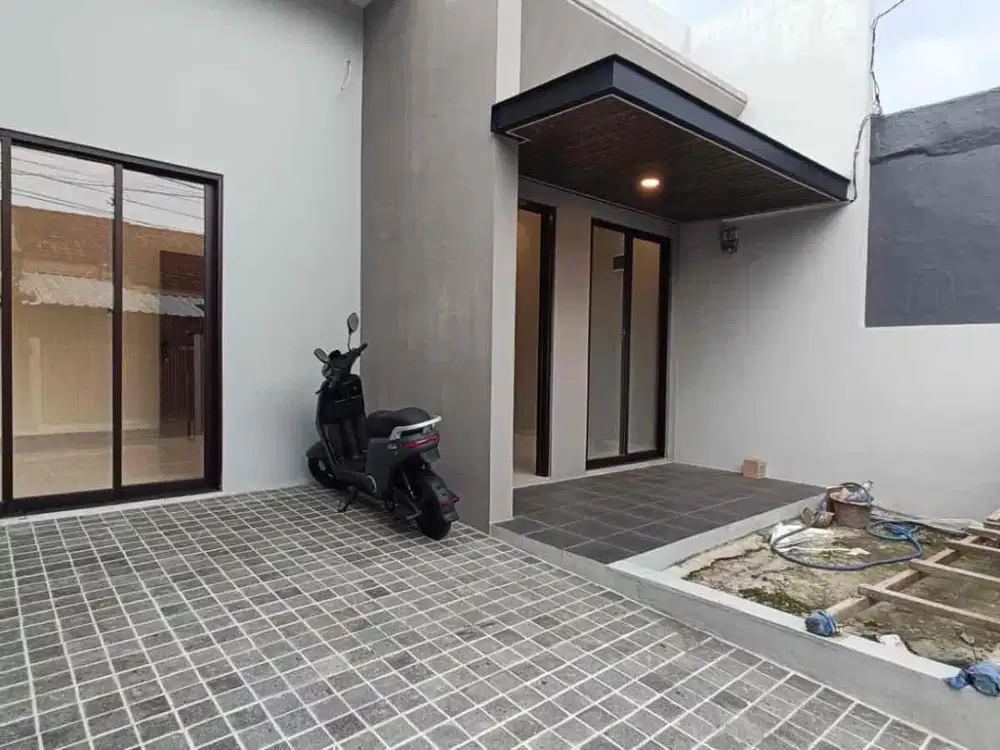 jual rumah baru full renovasi taman kopo indah 2