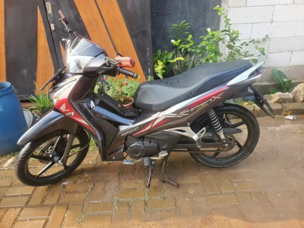 Supra x 125 tahun 2018 helm in