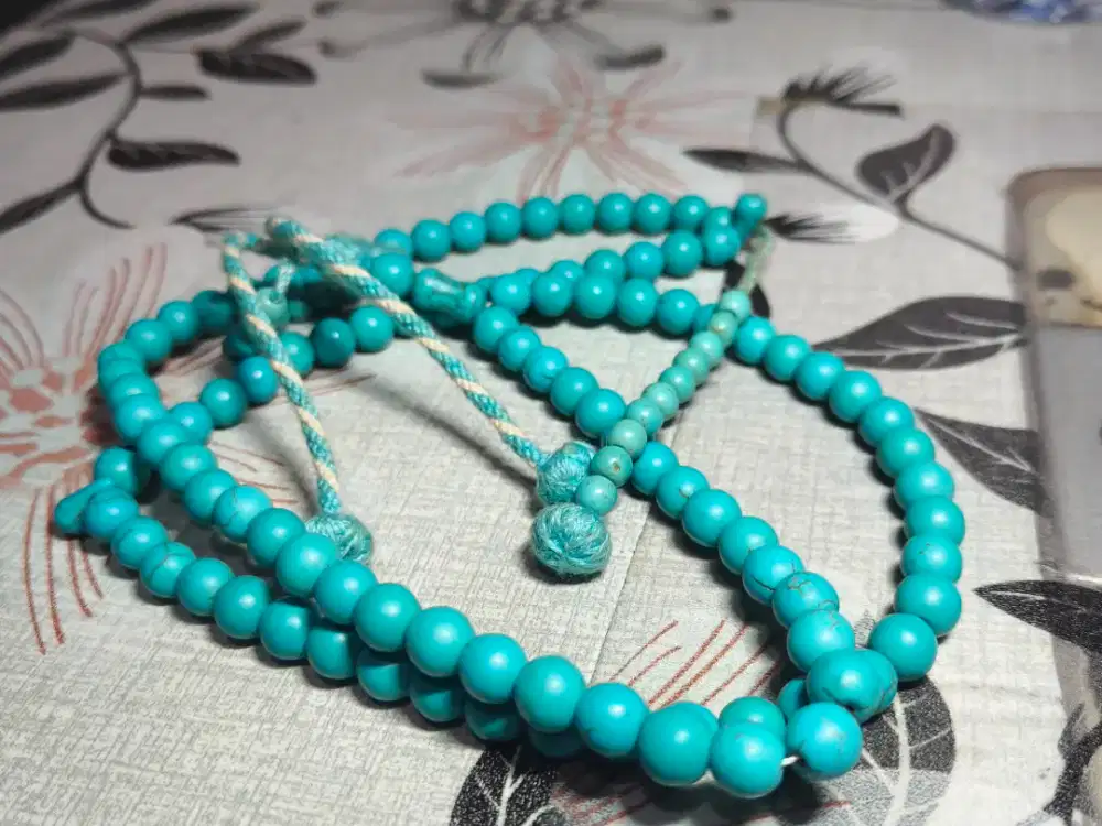 Tasbih batu virus import