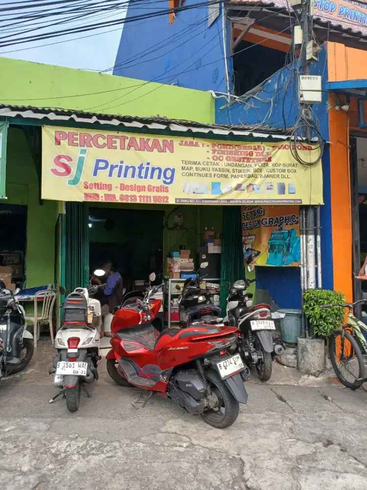 Karyawan Setting Desain