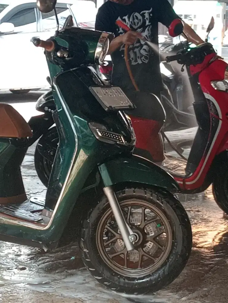 Packing dan cuci motor/mobil