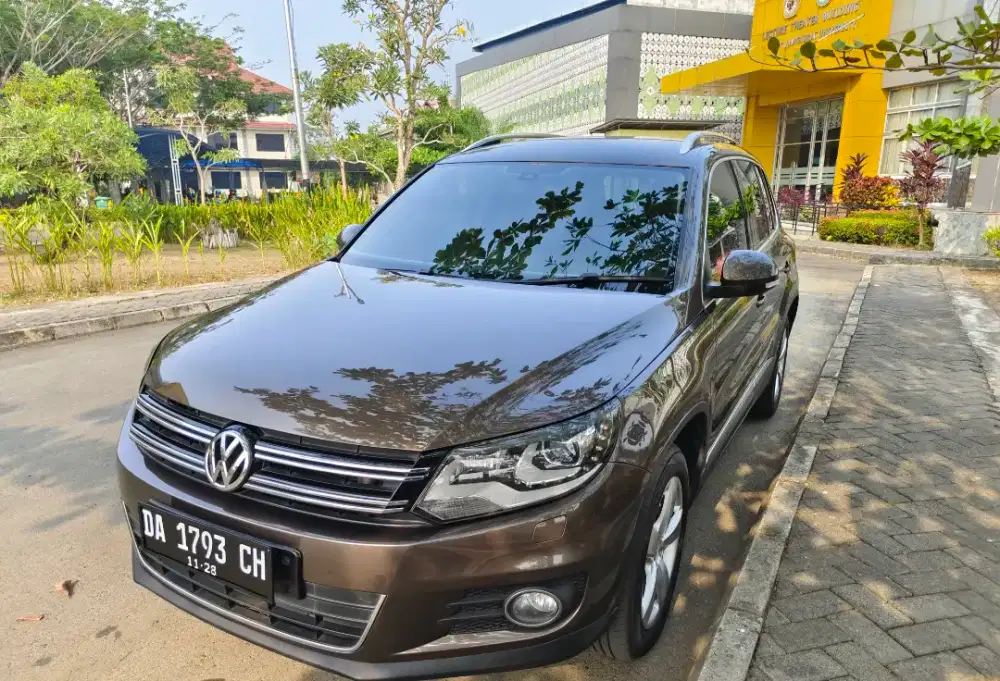 Volkswagen Tiguan 1.4 tdi at 2013