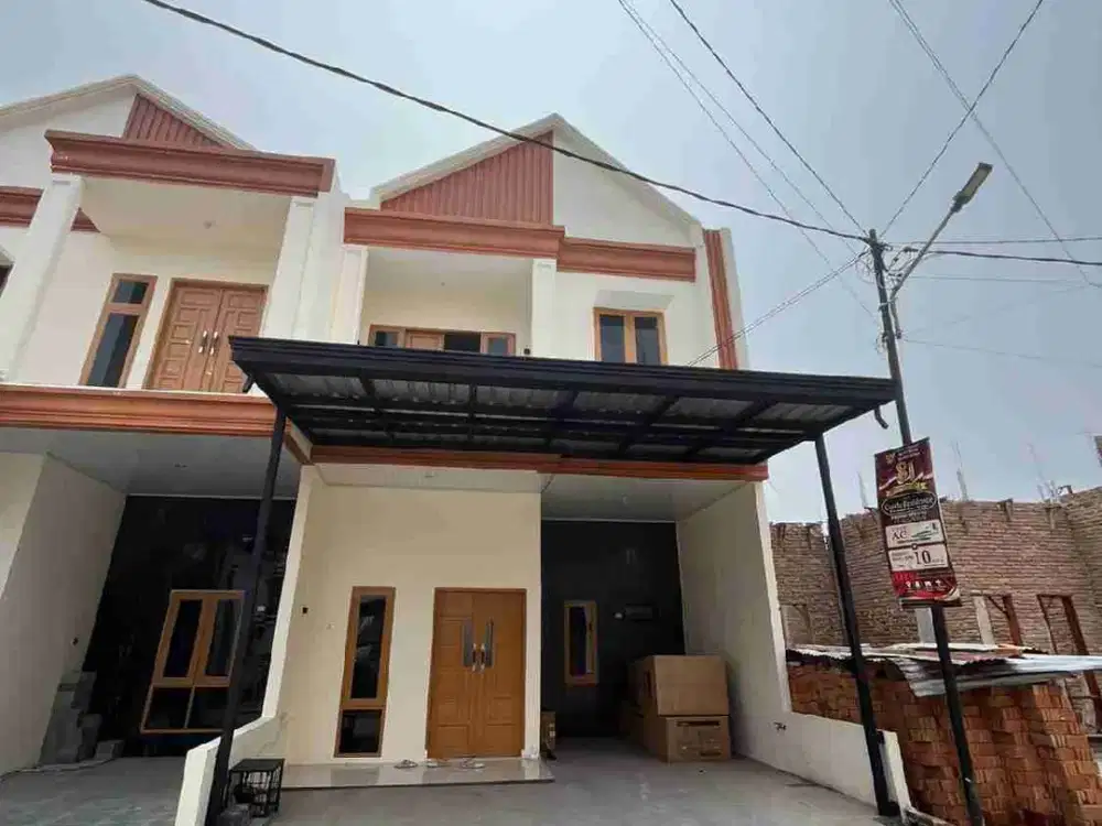 Rumah Cantik Akses Jl Bahagia by Pass Dekat Uisu