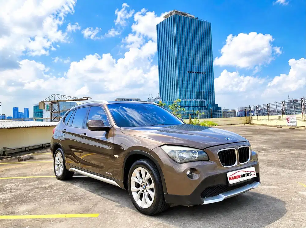 BMW X1 Executive 2011 Automatic Coklat Metalik