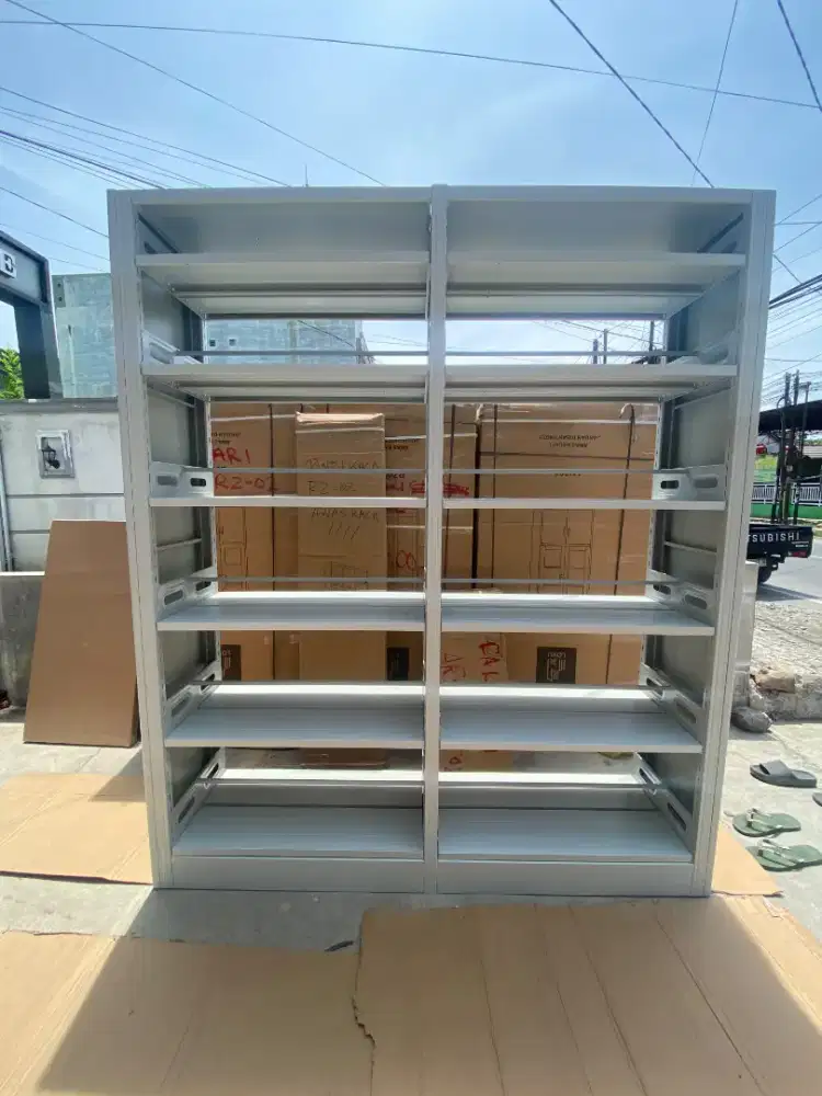 RAK BUKU 2 SISI BAHAN PLAT BESI